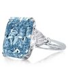 Three Stone Radiant Cut Blue Topaz Engagement Ring in Sterling Silver with Rhodium Plating
