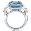 Three Stone Radiant Cut Blue Topaz Engagement Ring in Sterling Silver with Rhodium Plating