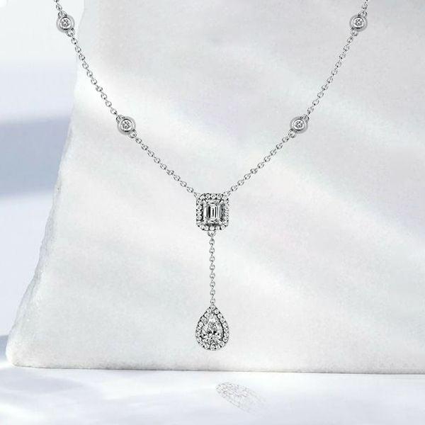 Sterling Silver Pear & Emerald Cut Twin Tie Halo Necklace with 4.83 CT. TW Stones