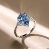 Pear Shaped Blue Topaz Engagement Ring in 925 Sterling Silver with Rhodium Finish