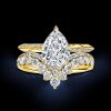 4.83 CTW Pear Cut Gemstone Bridal Set in Rhodium Plated Sterling Silver