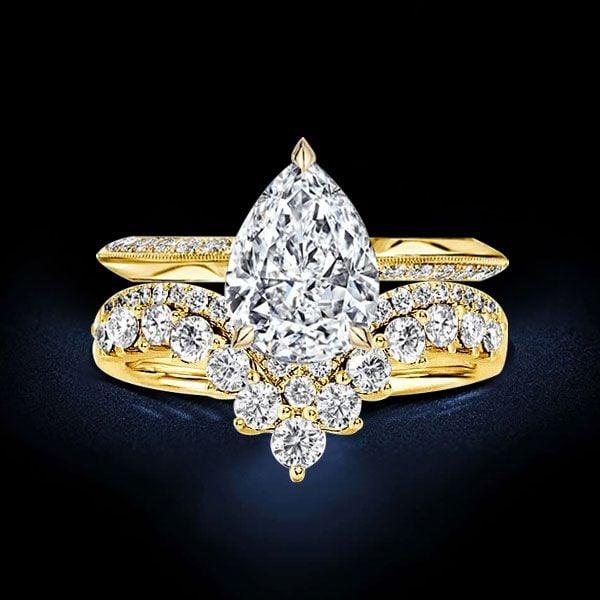 4.83 CTW Pear Cut Gemstone Bridal Set in Rhodium Plated Sterling Silver
