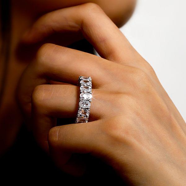 Oval Created White Sapphire Eternity Wedding Band in Sterling Silver