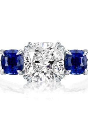 Three Stone Blue Topaz Engagement Ring in Rhodium Plated Sterling Silver