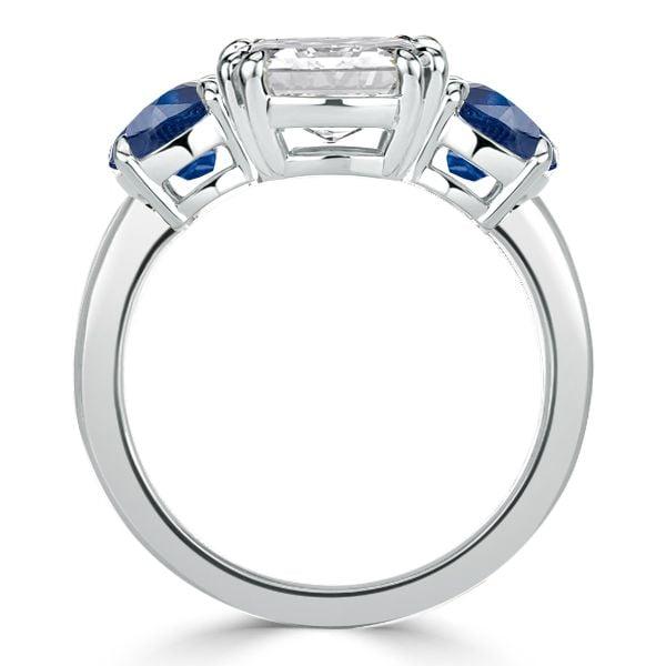 Three Stone Blue Topaz Engagement Ring in Rhodium Plated Sterling Silver