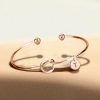 14K Rose Gold Open Twist Bangle Bracelet - Elegant & Lightweight