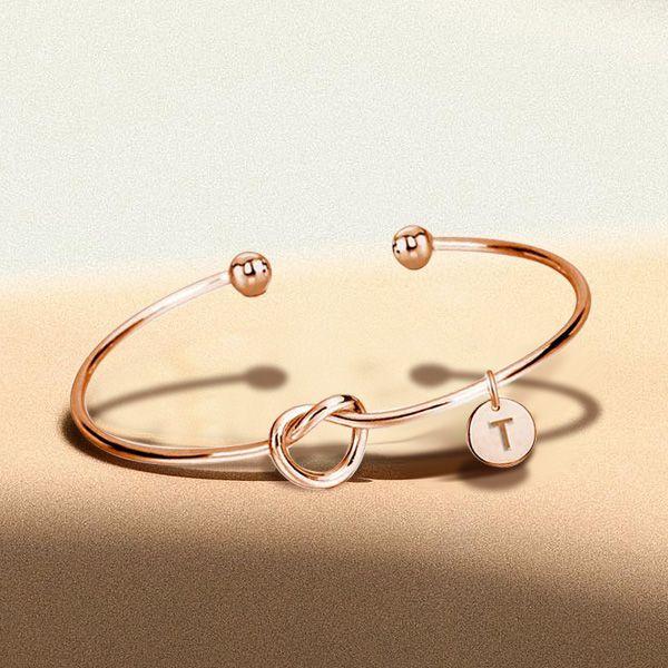 14K Rose Gold Open Twist Bangle Bracelet - Elegant & Lightweight