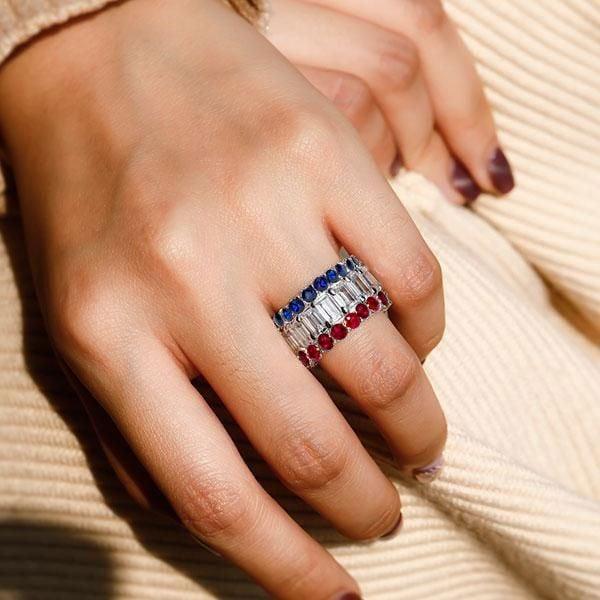 Emerald Cut Blue Sapphire and Ruby Eternity Band Ring in Sterling Silver