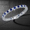 White & Blue Cushion Cut Cubic Zirconia Eternity Bracelet in Sterling Silver