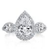 Pear Cut Three Stone Engagement Ring in Sterling Silver