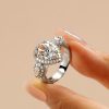 Pear Cut Three Stone Engagement Ring in Sterling Silver