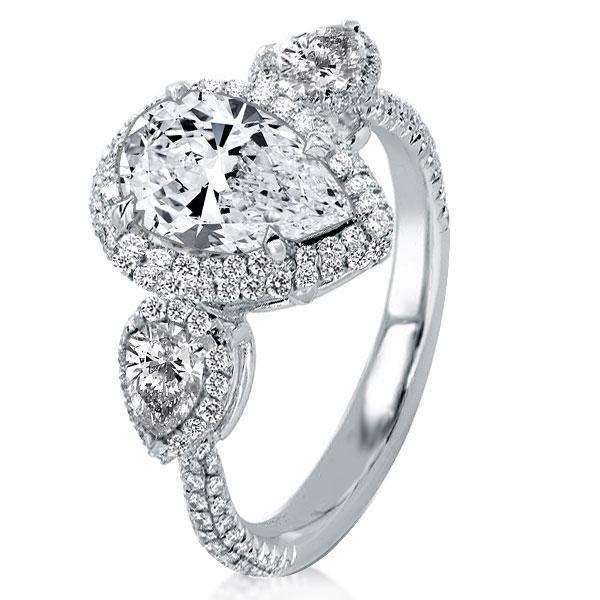Pear Cut Three Stone Engagement Ring in Sterling Silver