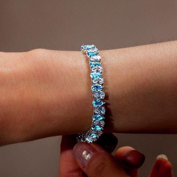 Pear Cut White & Aquamarine Tennis Bracelet in Sterling Silver with Rhodium Plating