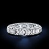 Emerald Cut Created White Sapphire Eternity Wedding Band in Rhodium Plated Sterling Silver