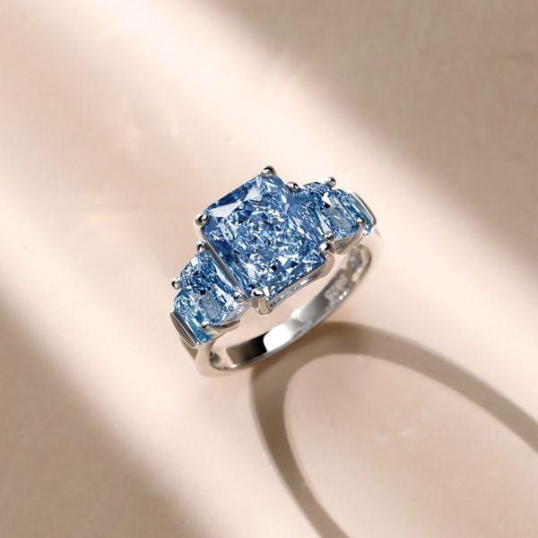 Radiant Cut Blue Topaz Five Stone Wedding Ring in Sterling Silver