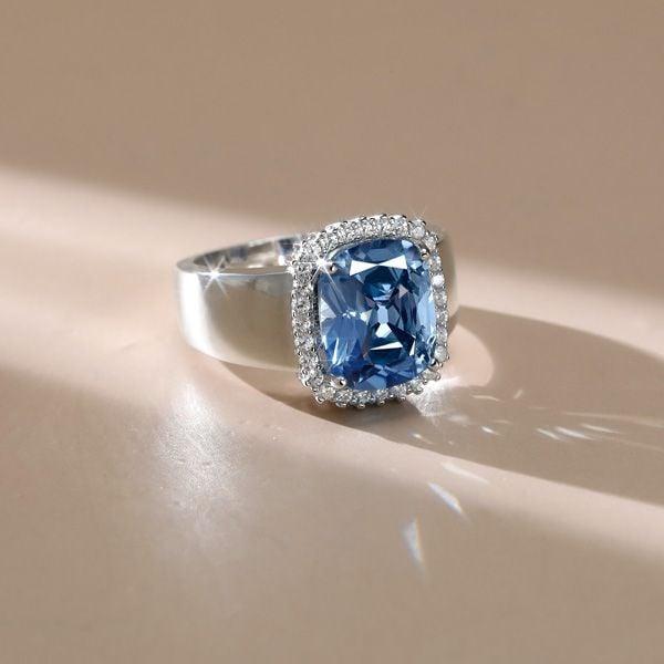 Cushion Cut Blue Topaz Engagement Ring with Halo Setting in Sterling Silver