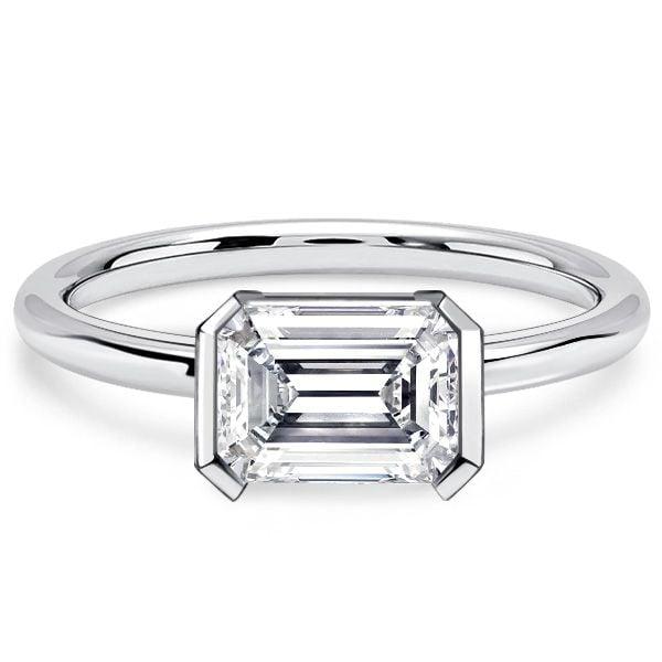 Emerald Cut White Sapphire Engagement Ring in Rhodium Plated Sterling Silver