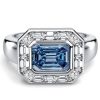 East West Emerald Cut Blue Topaz Engagement Ring in Sterling Silver
