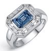 East West Emerald Cut Blue Topaz Engagement Ring in Sterling Silver