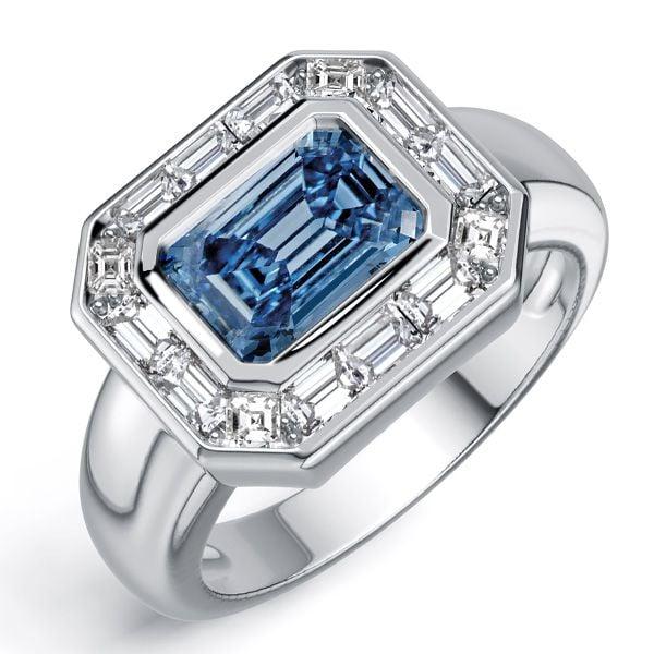 East West Emerald Cut Blue Topaz Engagement Ring in Sterling Silver