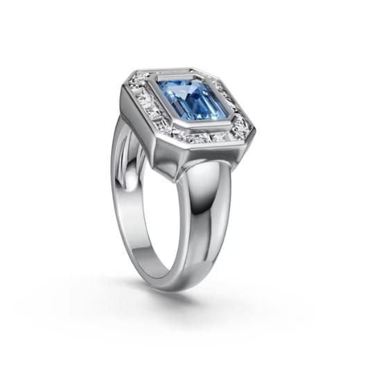 East West Emerald Cut Blue Topaz Engagement Ring in Sterling Silver