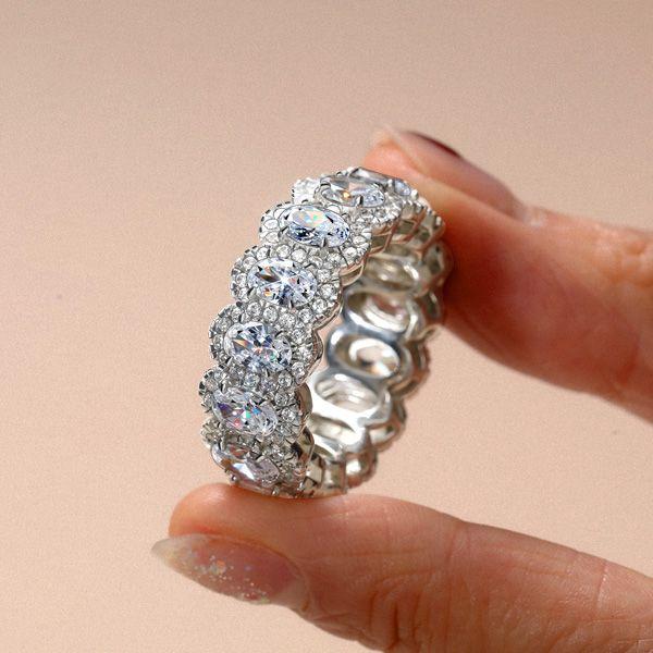 Oval Halo Eternity Wedding Band in Rhodium-Plated Sterling Silver