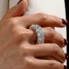 Oval Halo Eternity Wedding Band in Rhodium-Plated Sterling Silver