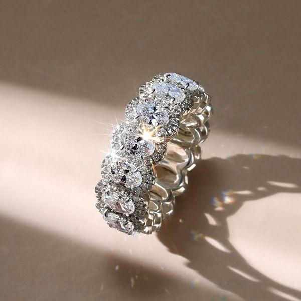 Oval Halo Eternity Wedding Band in Rhodium-Plated Sterling Silver