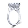 Three Stone Emerald Cut Created White Sapphire Engagement Ring in Rhodium Plated Sterling Silver