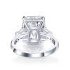 Three Stone Emerald Cut Created White Sapphire Engagement Ring in Rhodium Plated Sterling Silver