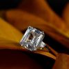 Three Stone Emerald Cut Created White Sapphire Engagement Ring in Rhodium Plated Sterling Silver