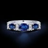 Blue Sapphire Oval Cut Half Eternity Wedding Band in Sterling Silver