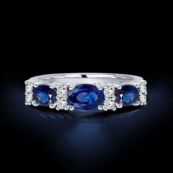 Blue Sapphire Oval Cut Half Eternity Wedding Band in Sterling Silver