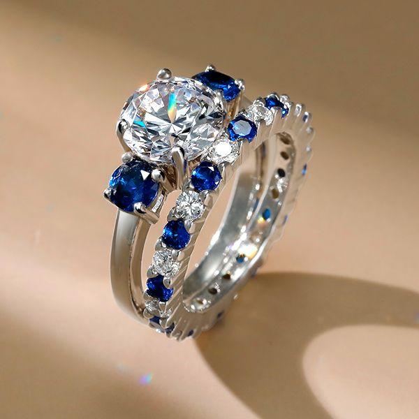 White & Blue Three Stone Round Cut Sterling Silver Bridal Ring Set