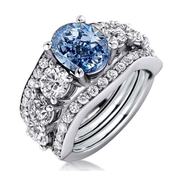Oval Blue and White Sapphire 3-Piece Wedding Ring Set in Rhodium-Plated Sterling Silver