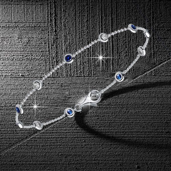 Bezel-Set White and Blue Sapphire Tennis Bracelet in Rhodium-Plated Sterling Silver