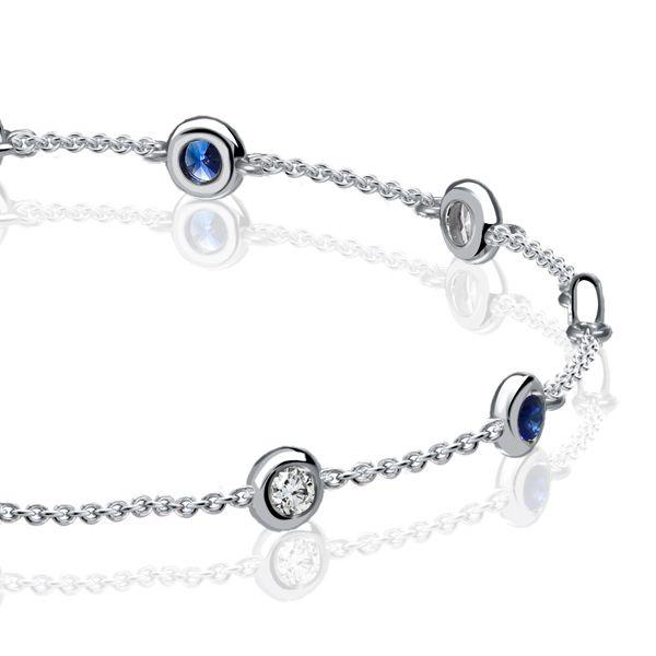 Bezel-Set White and Blue Sapphire Tennis Bracelet in Rhodium-Plated Sterling Silver