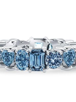 Multi Cut Blue Topaz Eternity Wedding Band in Rhodium Plated Sterling Silver