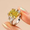 Radiant Yellow Center Stone Engagement Ring in Rhodium-Plated Sterling Silver