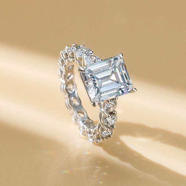 Emerald Cut Created White Sapphire Eternity Ring in Rhodium Plated 925 Sterling Silver