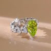 Pear Shaped Peridot Engagement Ring in Rhodium Plated Sterling Silver