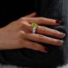 Pear Shaped Peridot Engagement Ring in Rhodium Plated Sterling Silver