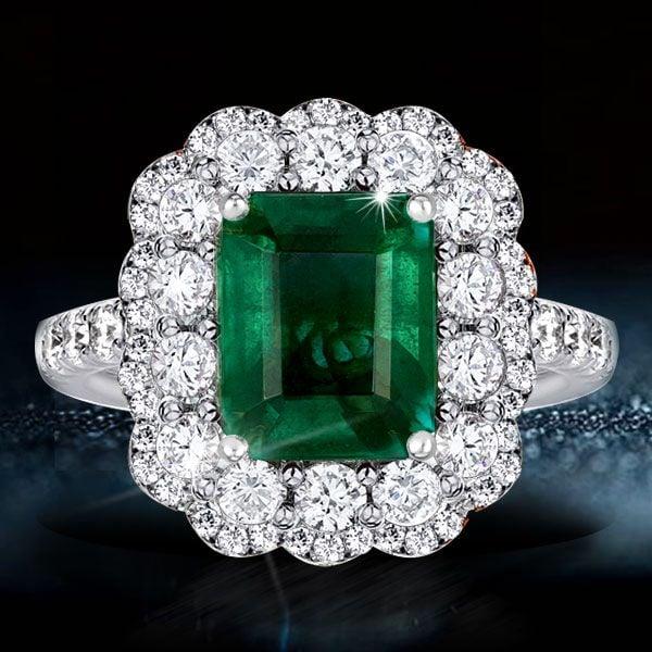 Vintage Emerald Cut Halo Engagement Ring in Rhodium Plated Sterling Silver