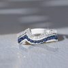 Two Row Channel Set Blue and White Sapphire Half Eternity Band Ring in Sterling Silver