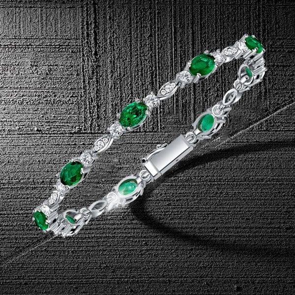 Oval Cut Emerald and Sapphire Tennis Bracelet in 925 Sterling Silver
