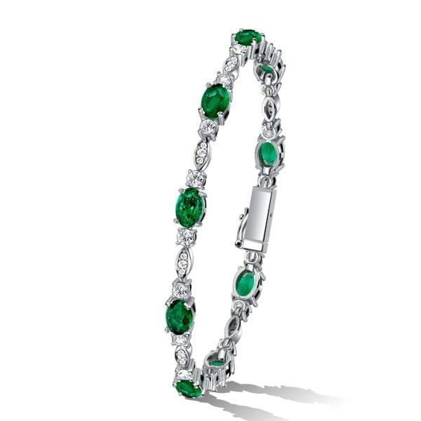 Oval Cut Emerald and Sapphire Tennis Bracelet in 925 Sterling Silver