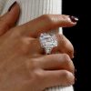 Three Stone Emerald Cut and Trillion Cut Engagement Ring in Rhodium Plated Sterling Silver