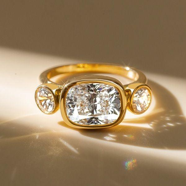 Cushion Cut 3 Stone Engagement Ring with Bezel Setting in 18K Gold Plated Sterling Silver