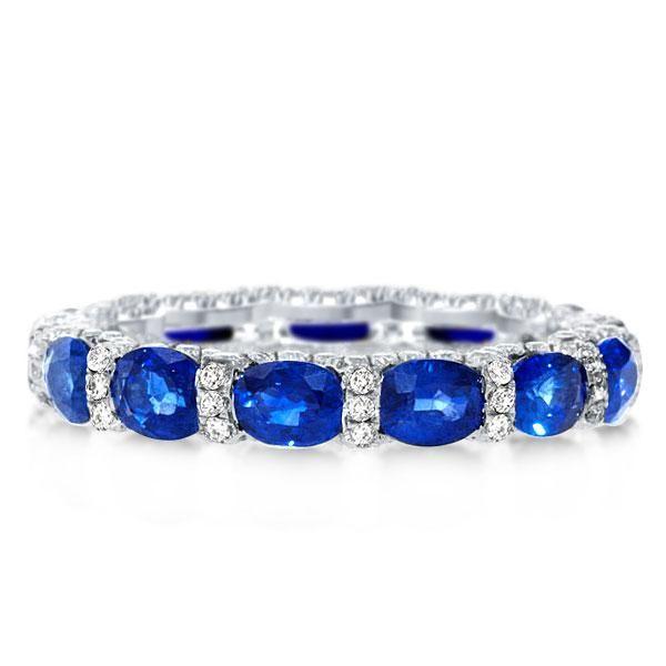 Oval Created Sapphire Wedding Band in Sterling Silver