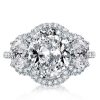 Oval White Sapphire Halo Three Stone Engagement Ring in Rhodium-Plated Sterling Silver